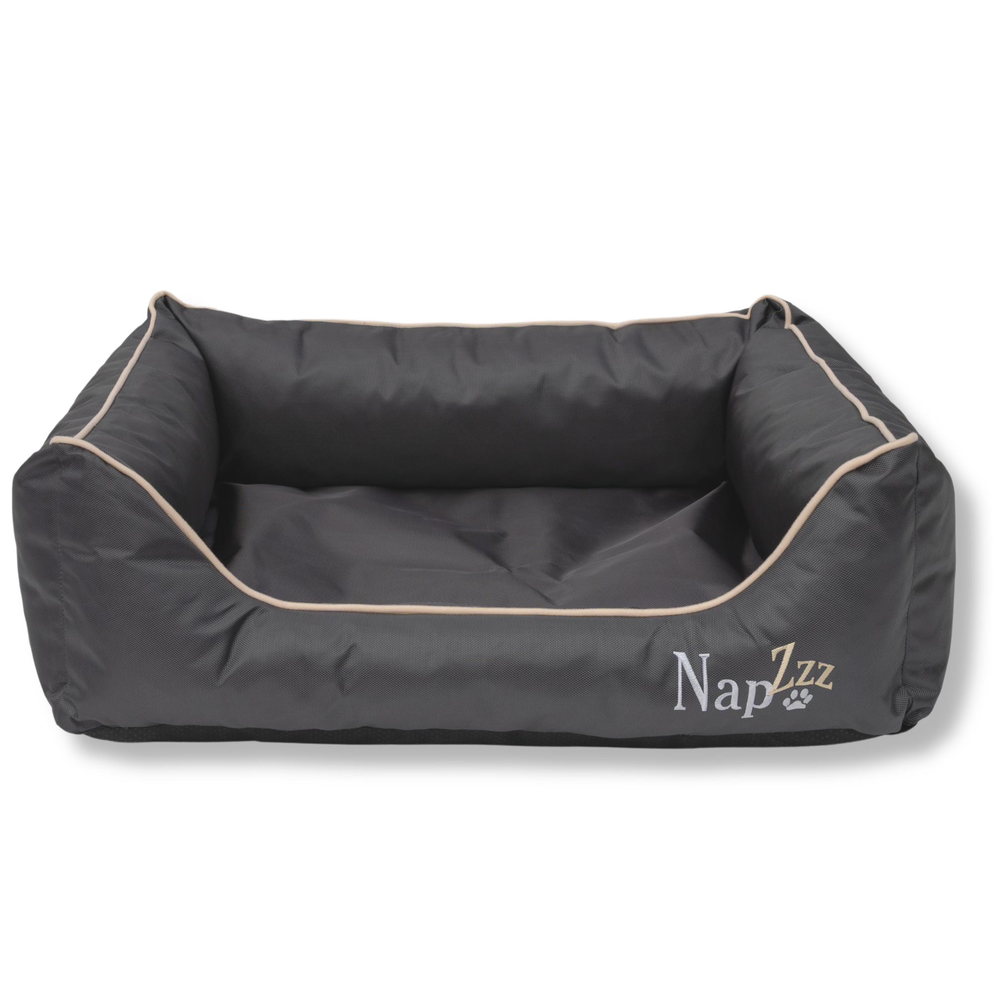 Napzzz divan waterproof antraciet in vooraanzicht. Stevige hondenmand van oxford materiaal dat waterafstotend is. De randen zijn zeer stevig gevuld met schuimvlokken voor extra steun en comfort. Uitneembare liggedeelte met schuimrubber matras. De mand is geheel voorzien van ritssluiting aan de binnenkant. Mooi afgewerkt en voorzien van napzzz logo. Verkrijgbaar in meerdere maten. 