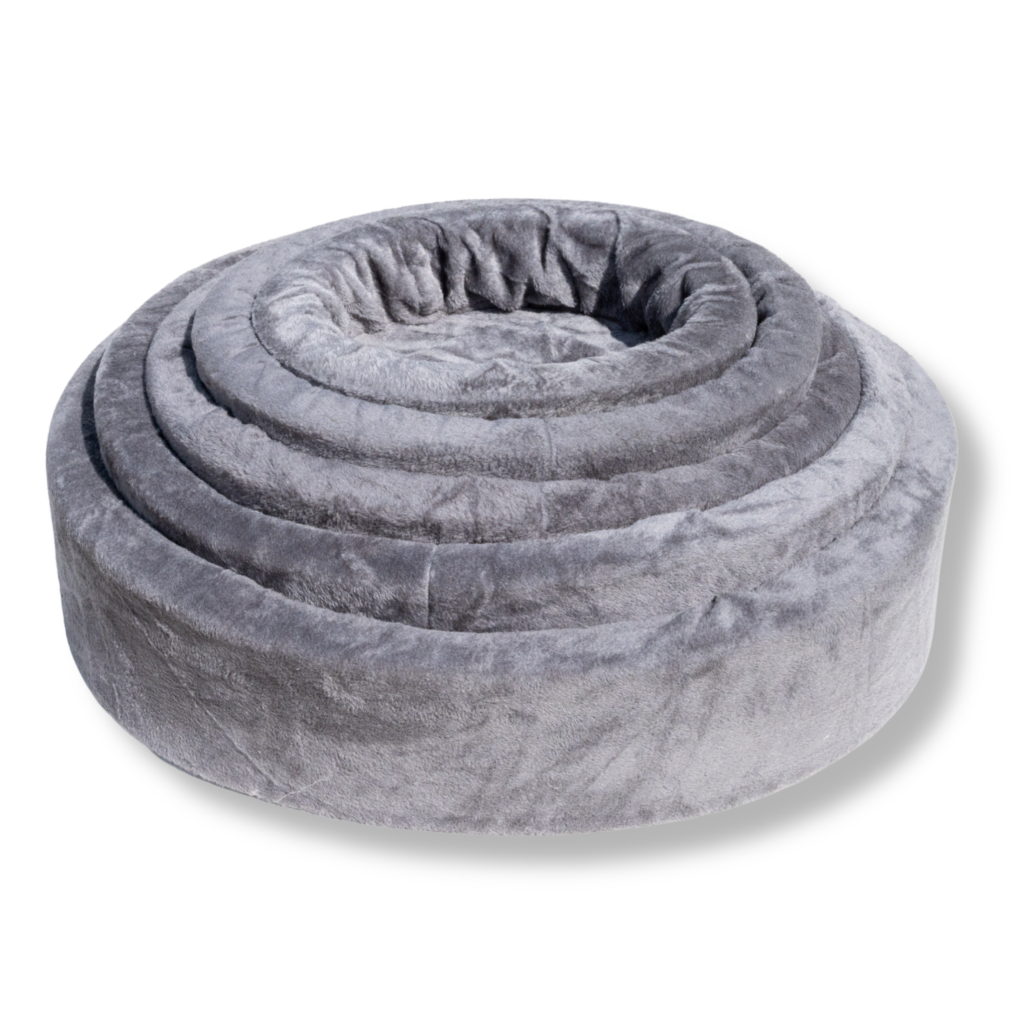 Meerdere ovale NapZZZ bontmanden in grijs, in elkaar gestapeld, zachte en comfortabele ligplekken voor katten en honden