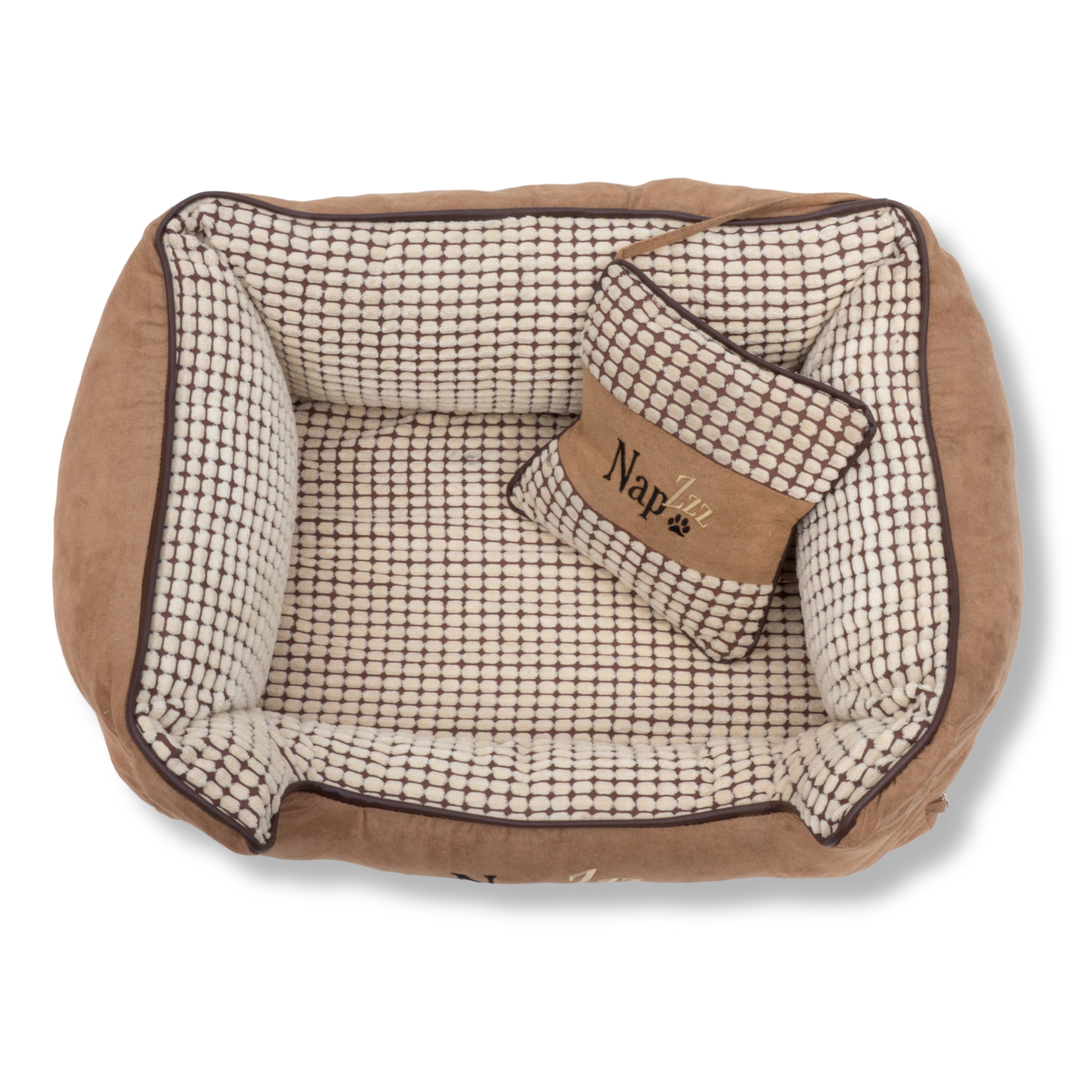 NapZZZ divan beige met kussen voor honden van bovenaf gezien. Mand is zeer stevig gevuld in de opstaande randen voor extra steun en comfort. 
De buitenstof heeft een fluweel look en de binnenzijde is bekleed met blokjes relief. Tevens voorzien van en afneembaar kussentje. Het liggedeelte is voorzien van een uitneembaar en omkeerbaar ligmatras. De ene kant is voorzien van blokjes relief en de andere zijde is voorzien van effen bruine stof zoals de buitenzijde. Mand voorzien van ritssluiting aan binnenzijde.